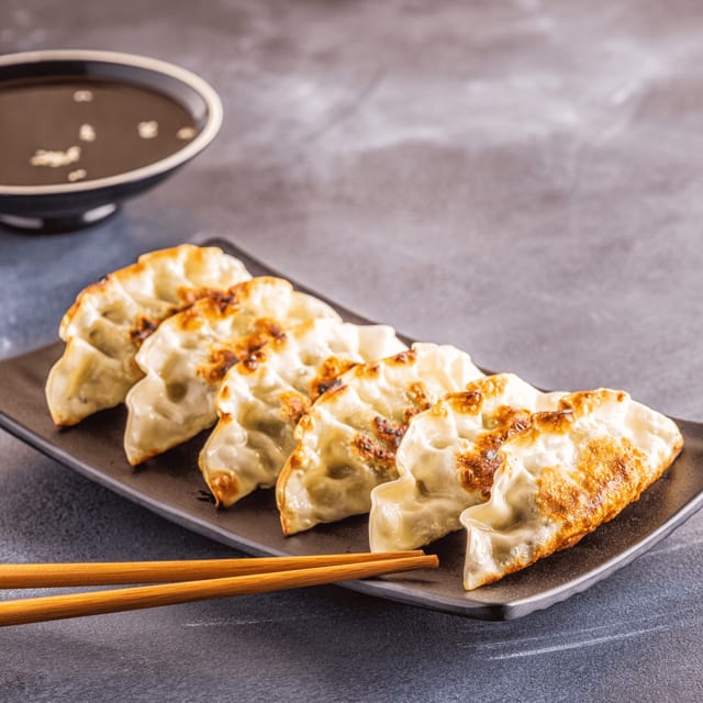 Vegetable or Chicken Momos.